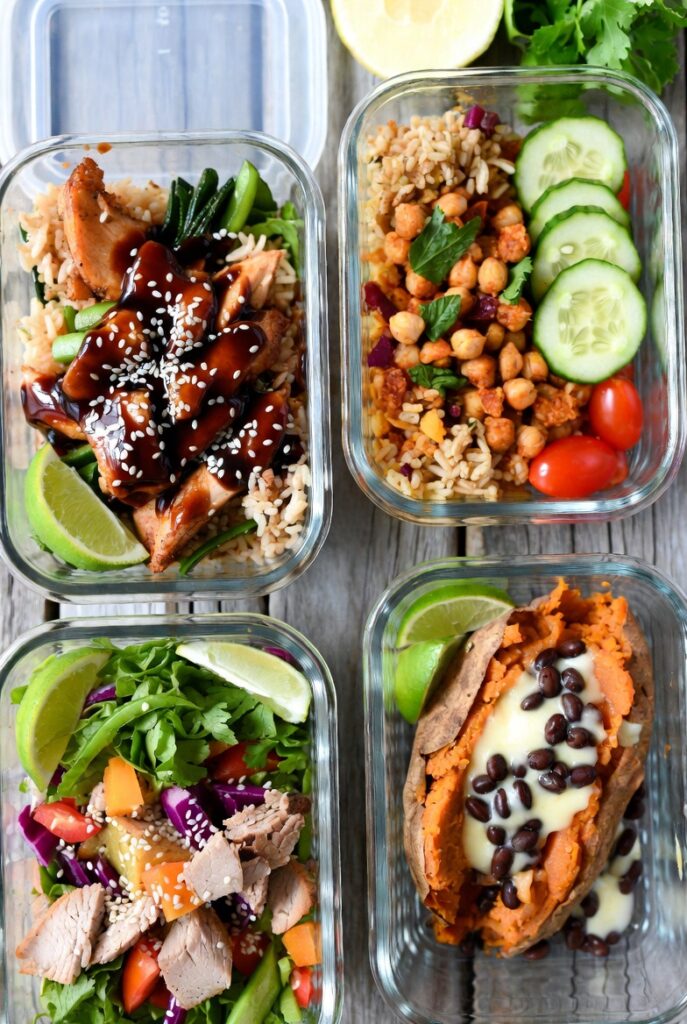 Meal prep lunch ideas for work featuring teriyaki chicken bowls, taco salad jars, and sweet potatoes
